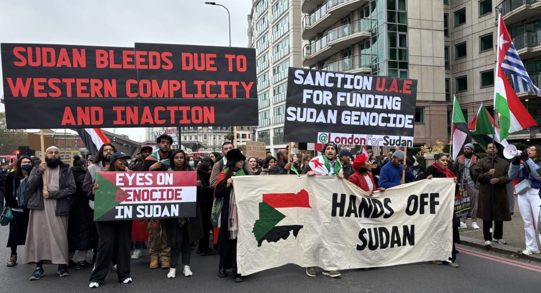 London 4 Sudan protest, banners read 'Hands off Sudan'
