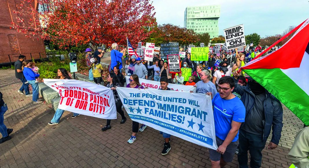 Protestors in Raleigh, North Carolina demonstrate against ICE raids on 15 November