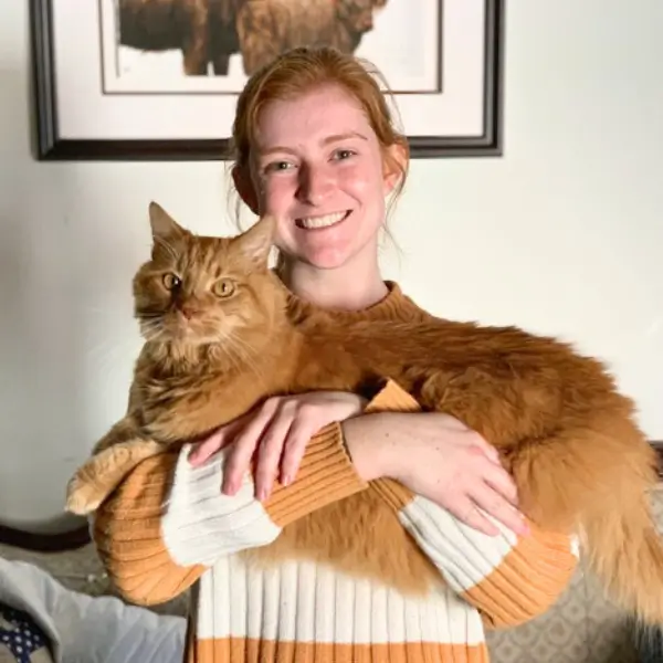 Darian holding her cat Tyler, remembered with a pet memorial diamond