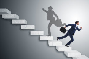 Businessman and his shadow in business concept