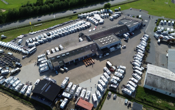 Luftfoto af Aabycamp butik
