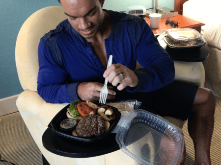 Sports coach Julien Quaglierini eating a balanced meal in preparation for a bodybuilding competition.