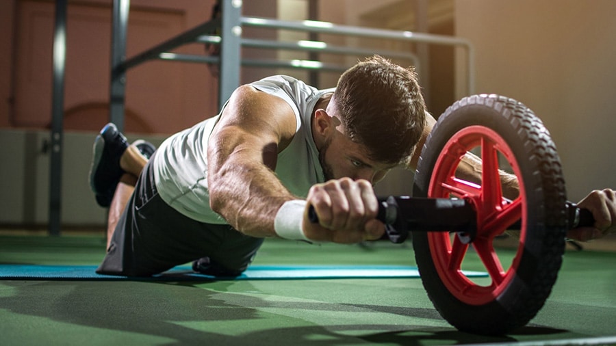 Find out how to use the ab wheel for your abs.