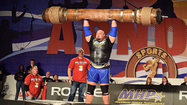 American strongman Brian Shaw wears a trunk over his head.