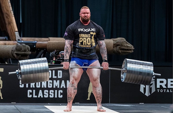 Hafthor Julius Björnsson does a deadlift during a strongman competition.