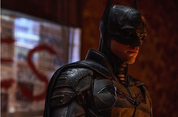 Robert Pattinson in the costume of the superhero Batman.