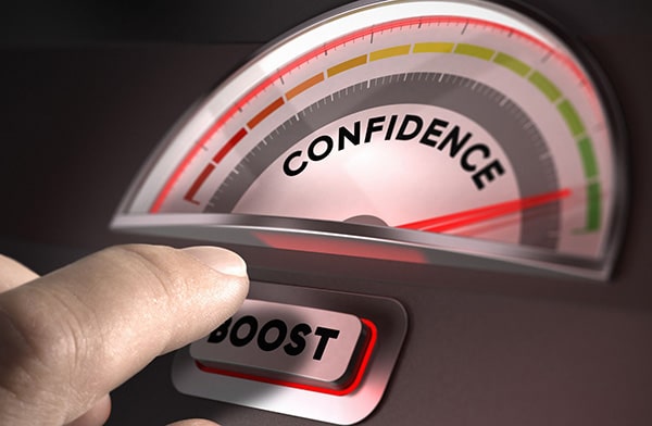 A self-confidence meter, with a boost button that a person presses.