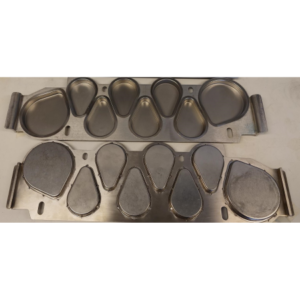 An NGI tray with cups which have been welded. Usually none or very minor signs of welding. At the most some discolouration may occur