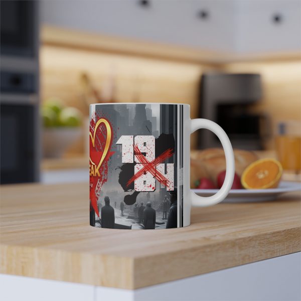 Side view of the mug showing "1984" crossed out with red spatters against a grey dystopian city background.