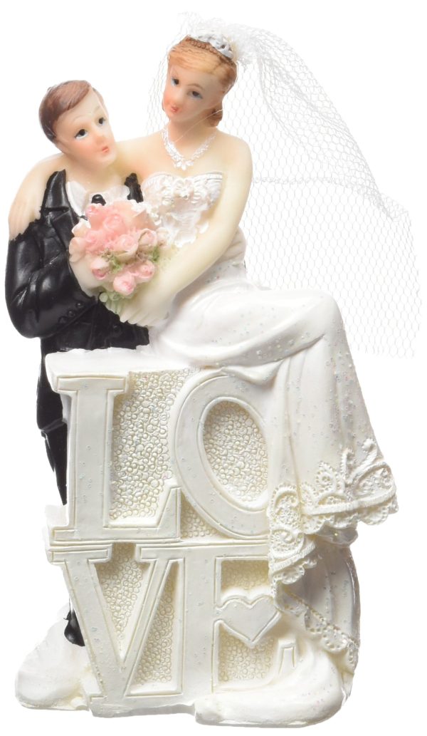 Figurine gâteau de mariage d'une mariée et du marié, avec les lettres LOVE .