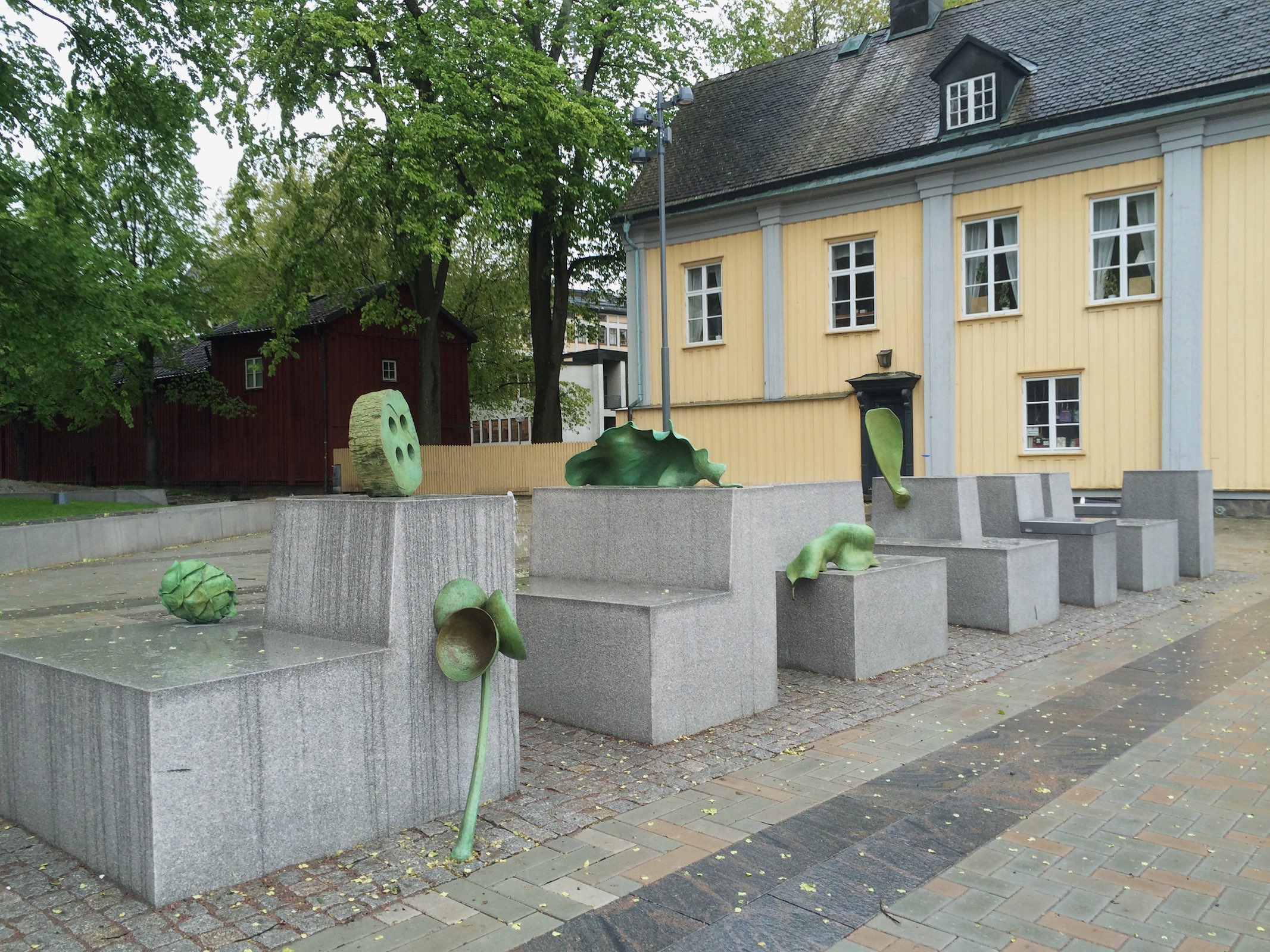 Carl Boutard, River Walk, 2015, comissioned by Karlstad Municipality. A site specific permanent installation in public space consisting of enlarged fragments of nature. In themselves insignificant these minuscule objects were found and carefully chosen by the artist during strolls along the adjacent Klarälven river. One of the bronze sculptures is situated 25 feet up in an elm tree. It was modelled with maple trees cut down while renovating the site.