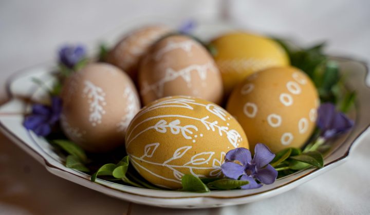 yellow and purple egg on green and white floral ceramic plate