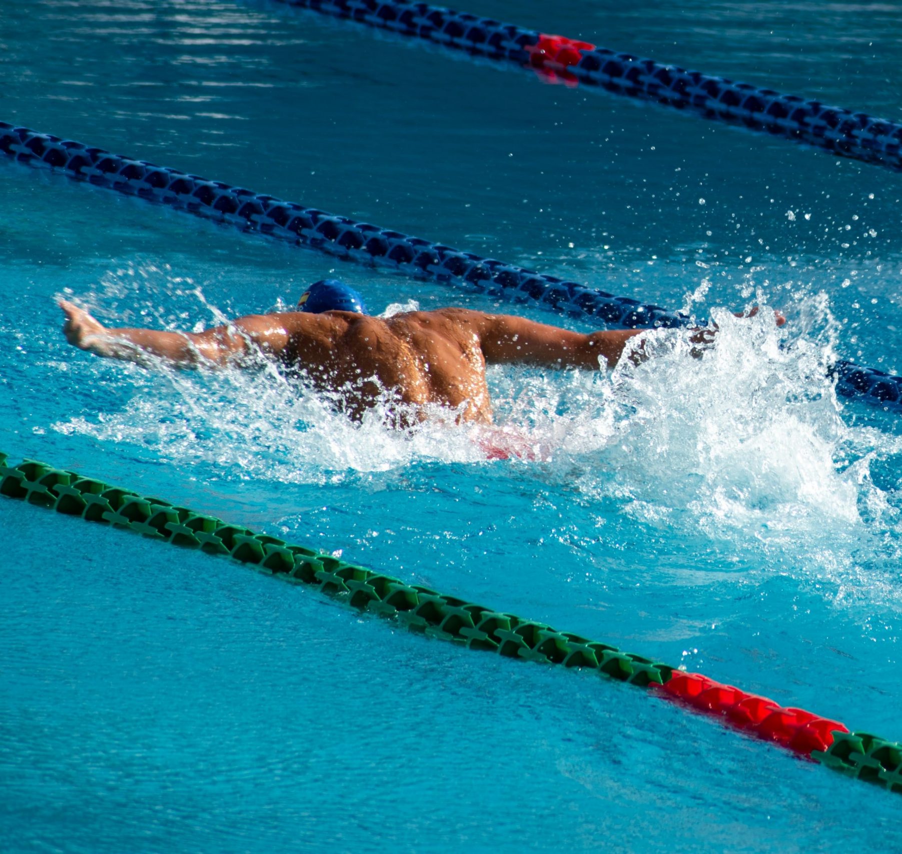 Man swimming in swimming pool