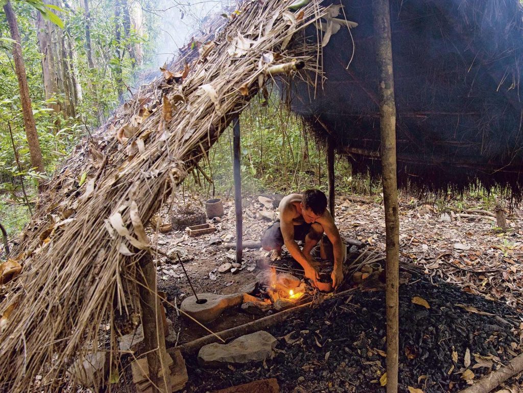 Crafting a makeshift shelter for survival