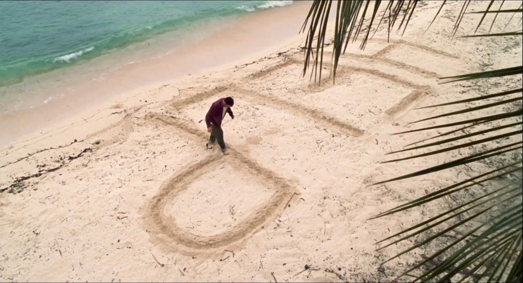 Drawing a help text on a desert island shore