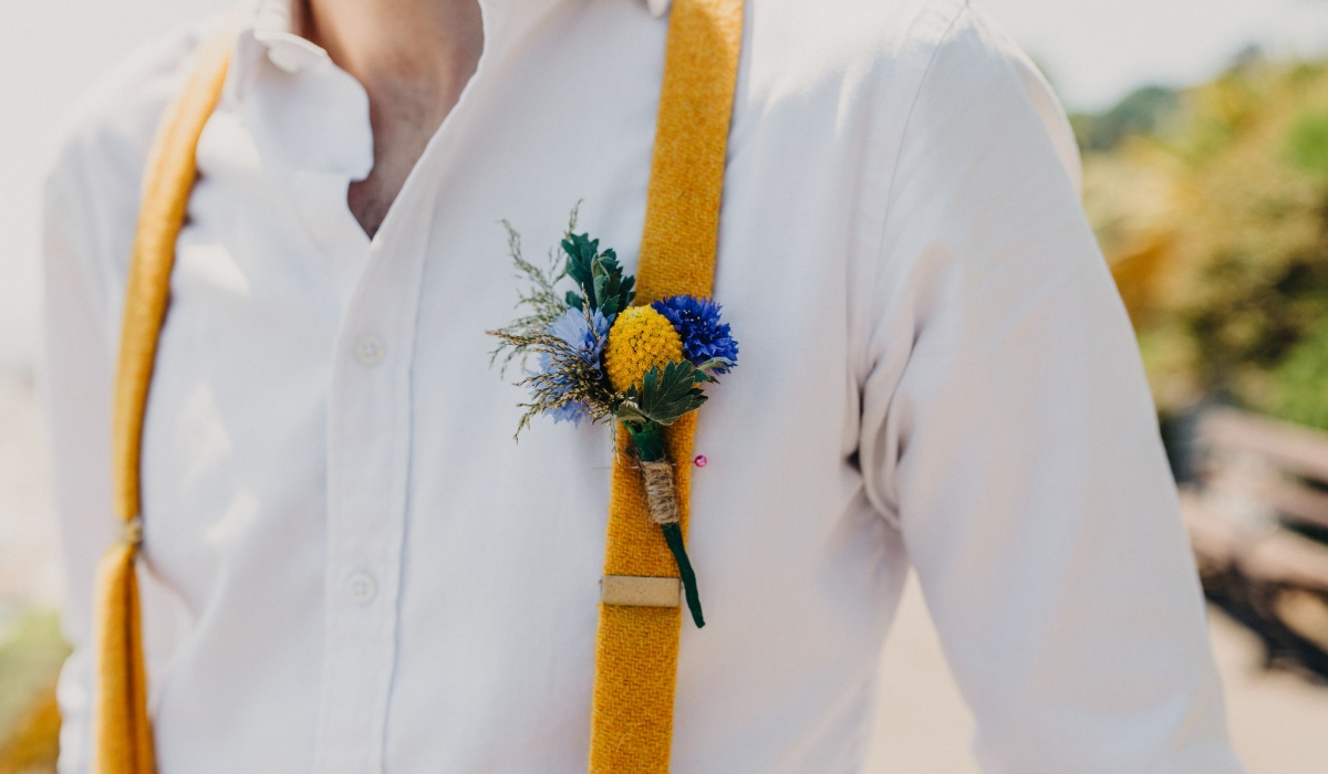 buttonhole and yellow braces - Dorset weddings British Flowers