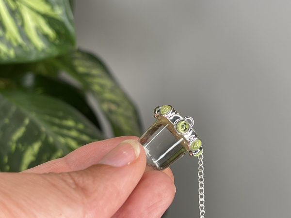Alternative view of Bergkristall mit Peridot Pendel