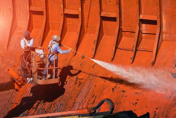 Two,Worker,High,Pressure,Water,Jet,To,Cleaning,With,Old Neutral HCF Cargo Ship Cleaning