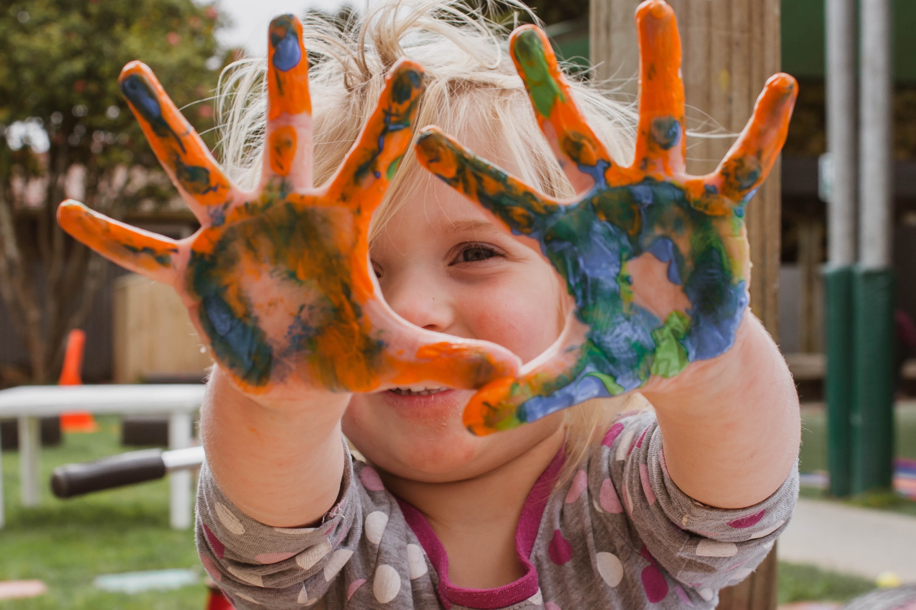 image of child with painted hands