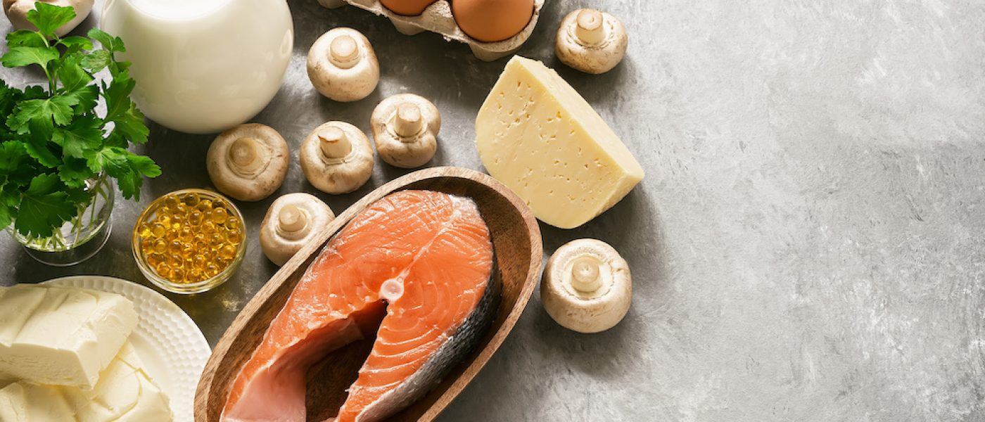 Set of foods rich in vitamin D on a gray background. The concept of healthy diet food. View from above