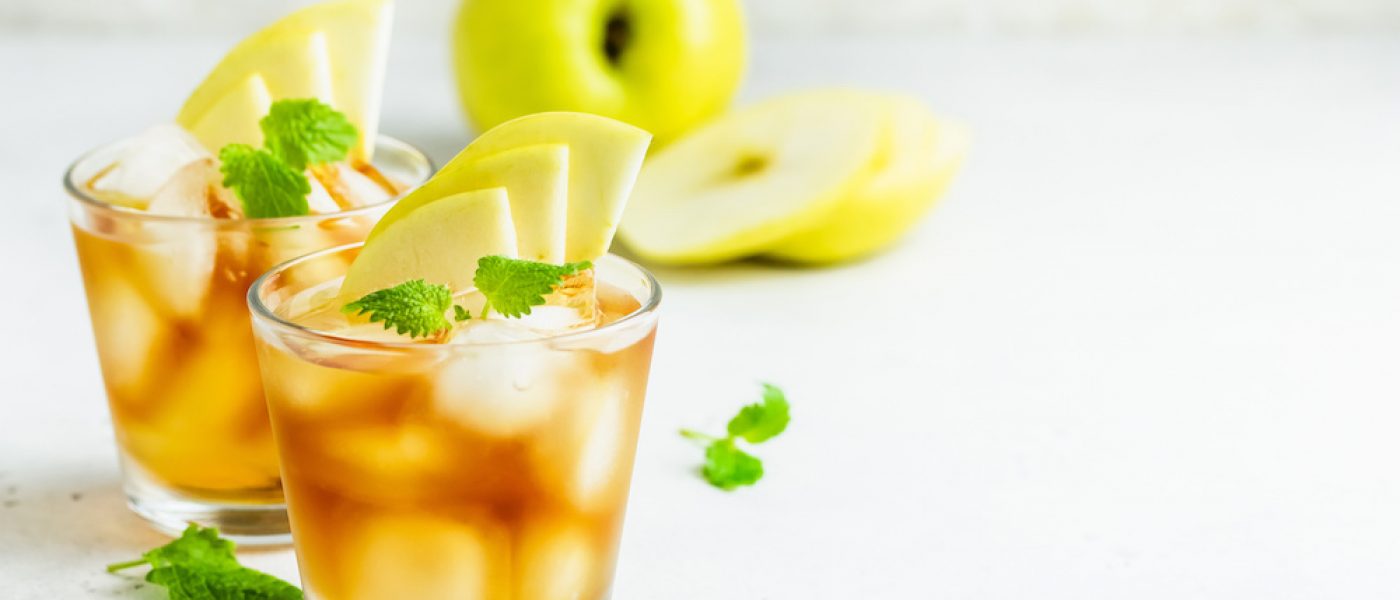 apple iced tea in glasses. Space for text.