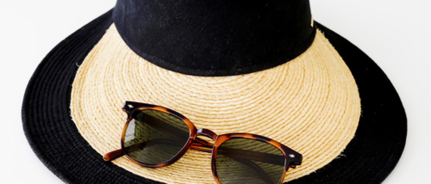 Sol, hat og briller
