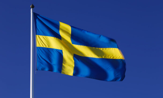 swedish flag Swedish flag flying in the wind