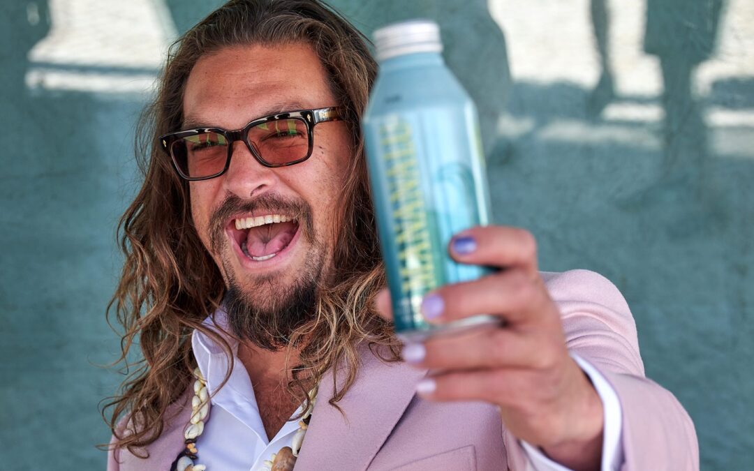 Jason Momoa Serves Drinks on a Hawaiian Airlines Flight to Celebrate His Water Brand — See the Fun Video