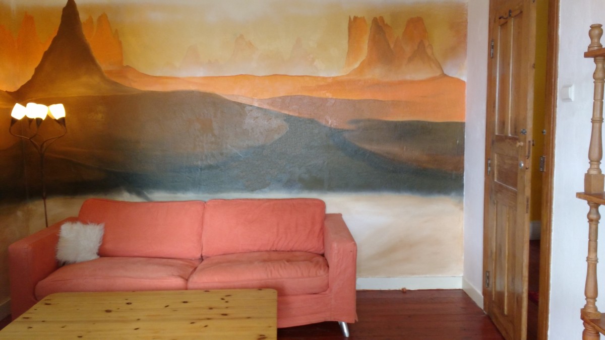 a-mural-of-a-deserted-landscape-in-a-holidayhouse