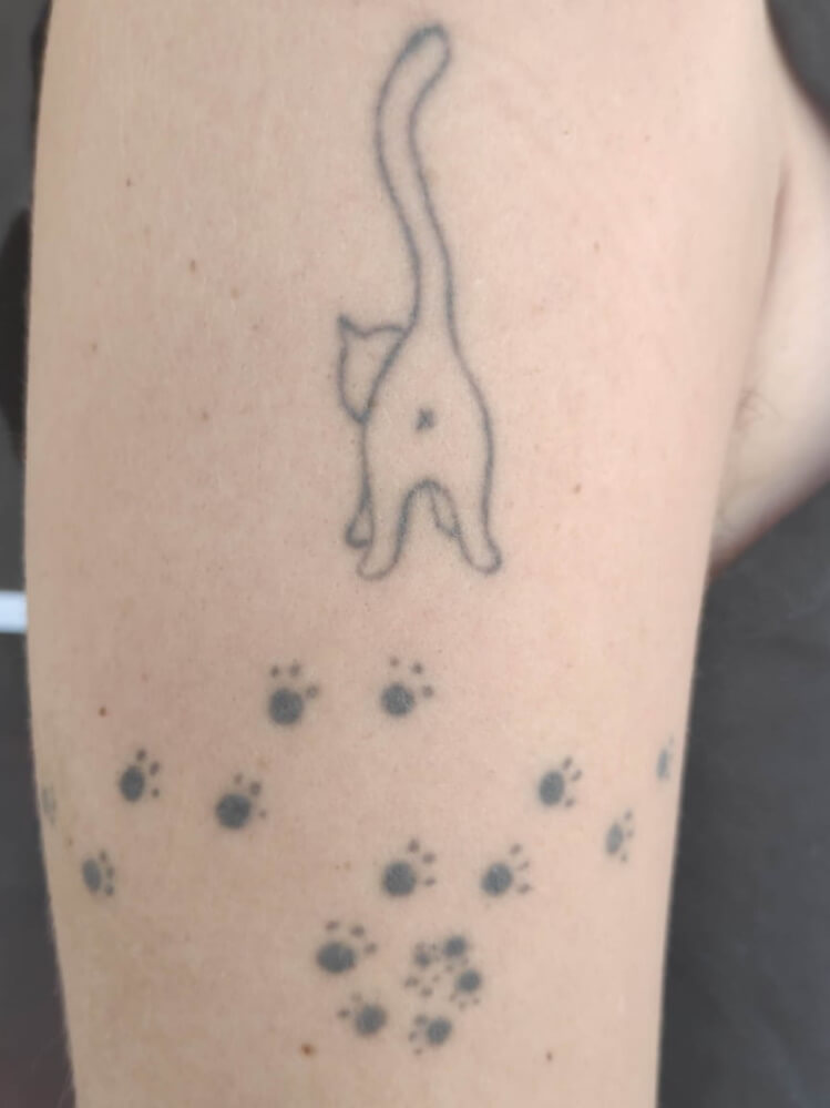 tattoo met kattenpootjes