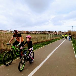 father and daughter riding together near Stockmoor