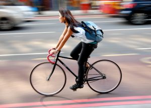 young woman on a bike