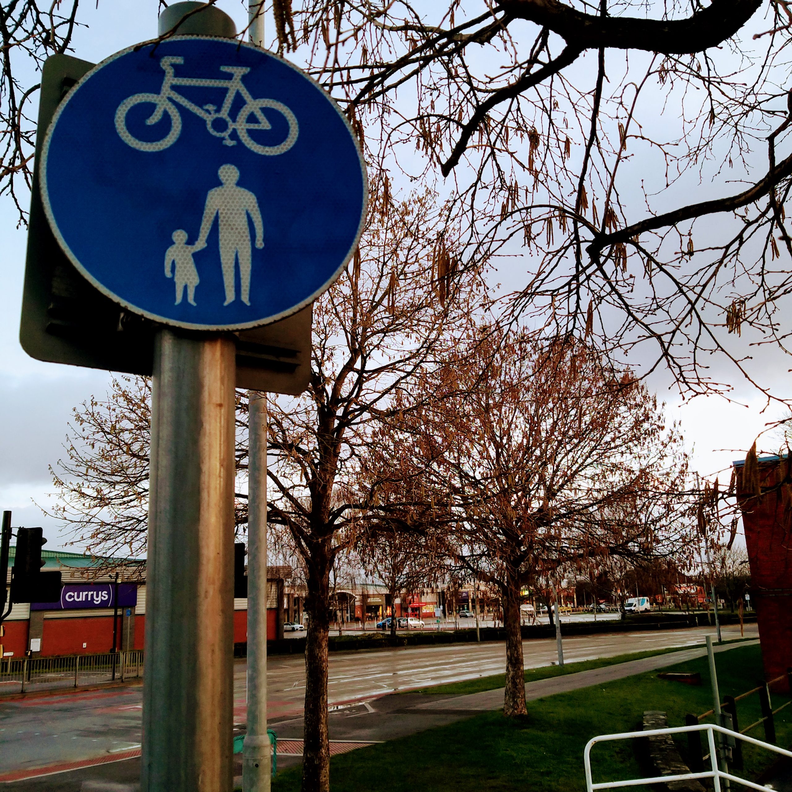 active travel sign above The Clink