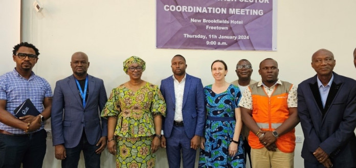 Minister of Water Resources and Sanitation) and her Deputy (Third and Fourth from Left respectively) pose with WASH Sector Representatives including WHH Sierra Leone, represented by Frederick Fabba, Head of Project WASH (Third from right).