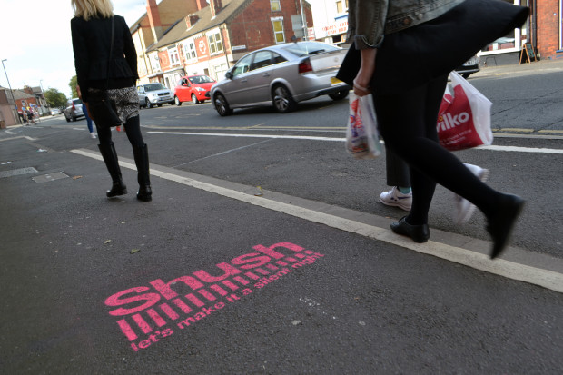 Shush campaign logo sprayed in pink upon the pavement on Carholme Road (Picture: Gregor Smith)