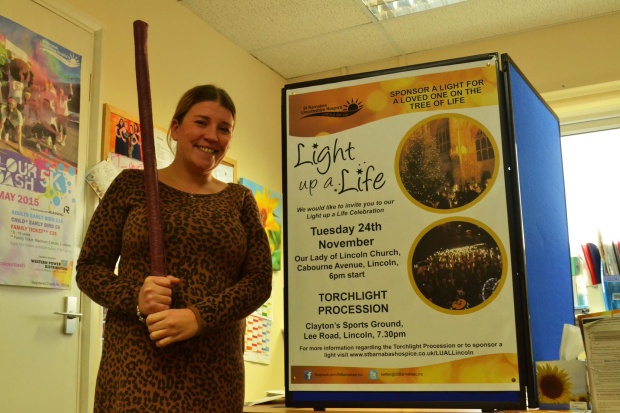 Becky Otter, holding a torch (Photo: Jasmin James)