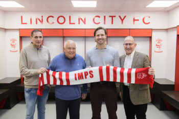 From left, Lincoln City chairman Clive Nates, Lincoln City investors Ron Fowler and Andrew Fowler and Lincoln City director Harvey Jabara in the home changing room at the club’s LNER Stadium, Lincoln, Lincolnshire. Picture: Chris Vaughan Photography for Lincoln City FC Date: April 22, 2024