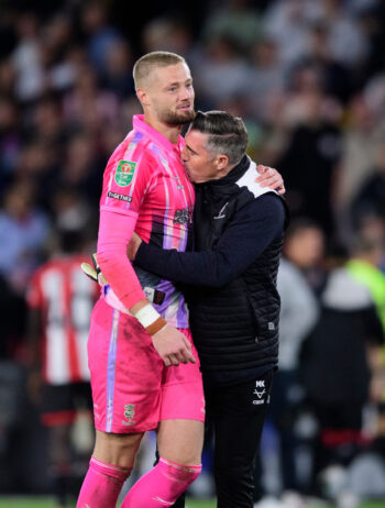 Lincoln City's Mark Kennedy and Lukas Jensen