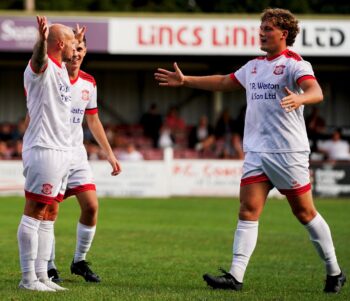 Lincoln United's Paul Grimes and Henry Moore