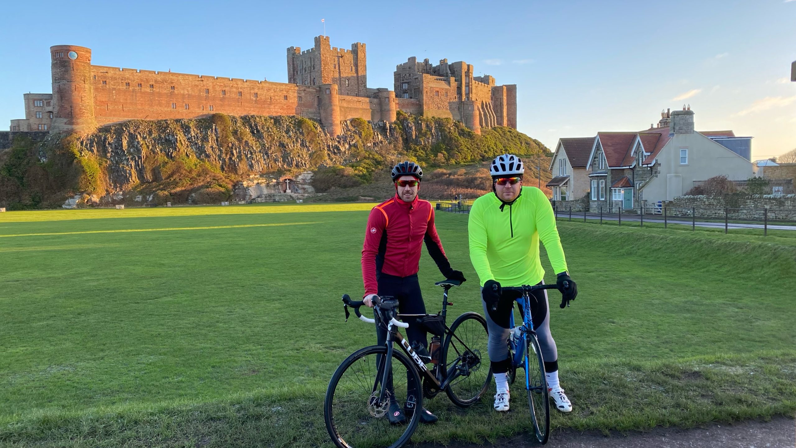 cyclists outside bambrough castle