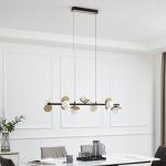 Lucande LED-pendel Pallo, 7-lys, svart/gull, glass