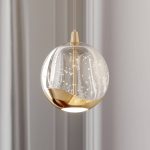 Lucande LED-pendellampe Hayley, gull, 1 lyskilde, glass