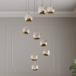 Lucande hengelampe Hayley, gull, 9 lyskilder, glass