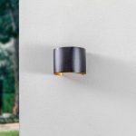 Lindby LED utend⌀rs vegglampe Nivar, rund, svart/gullfarget