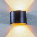 Lindby LED utend⌀rs vegglampe Nivar, rund, svart/gullfarget