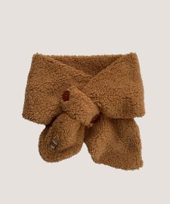 Warme Teddy Caramel Das gemaakt van zachte, luxe teddy stof in een karamelkleur, met een praktische knoopsluiting, perfect voor baby's en peuters.