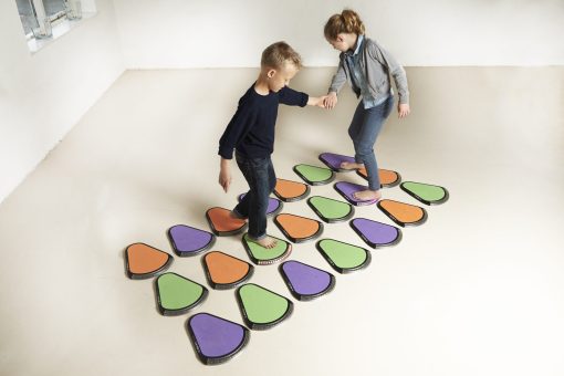 treax pads on floor with children