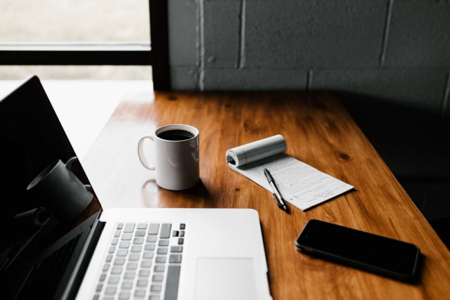 office table with laptop