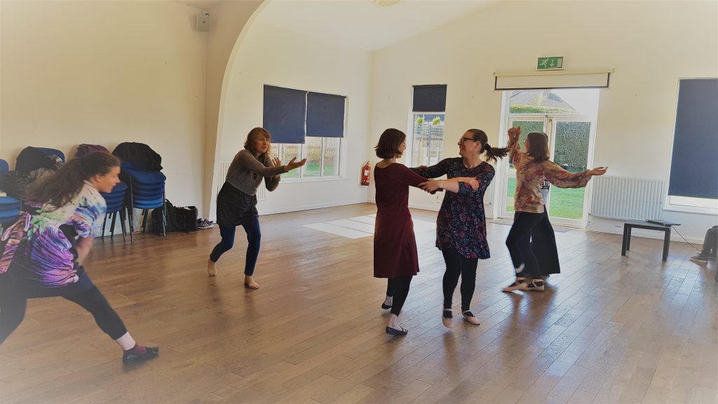 Dancing together at a dance ministry teaching workshop.