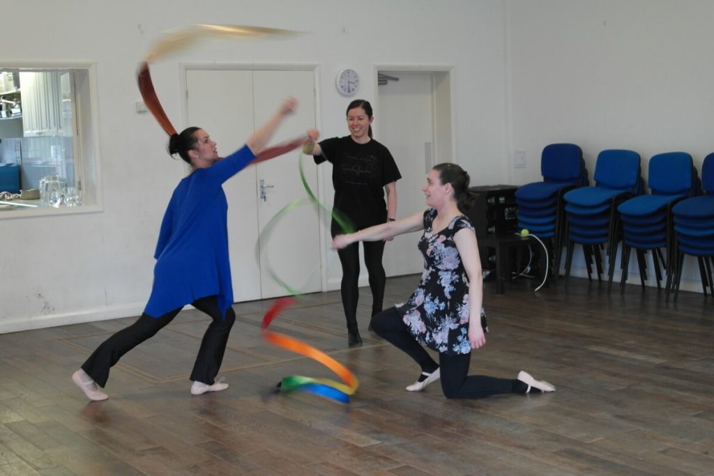 Group of dancers using ribbons in worship.